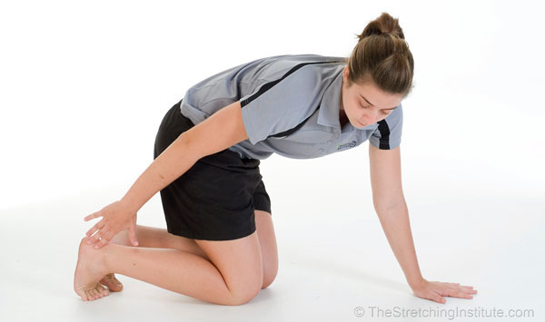 Kneeling Reach-around Stretch